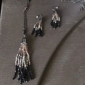 Cute necklace with matching earrings.